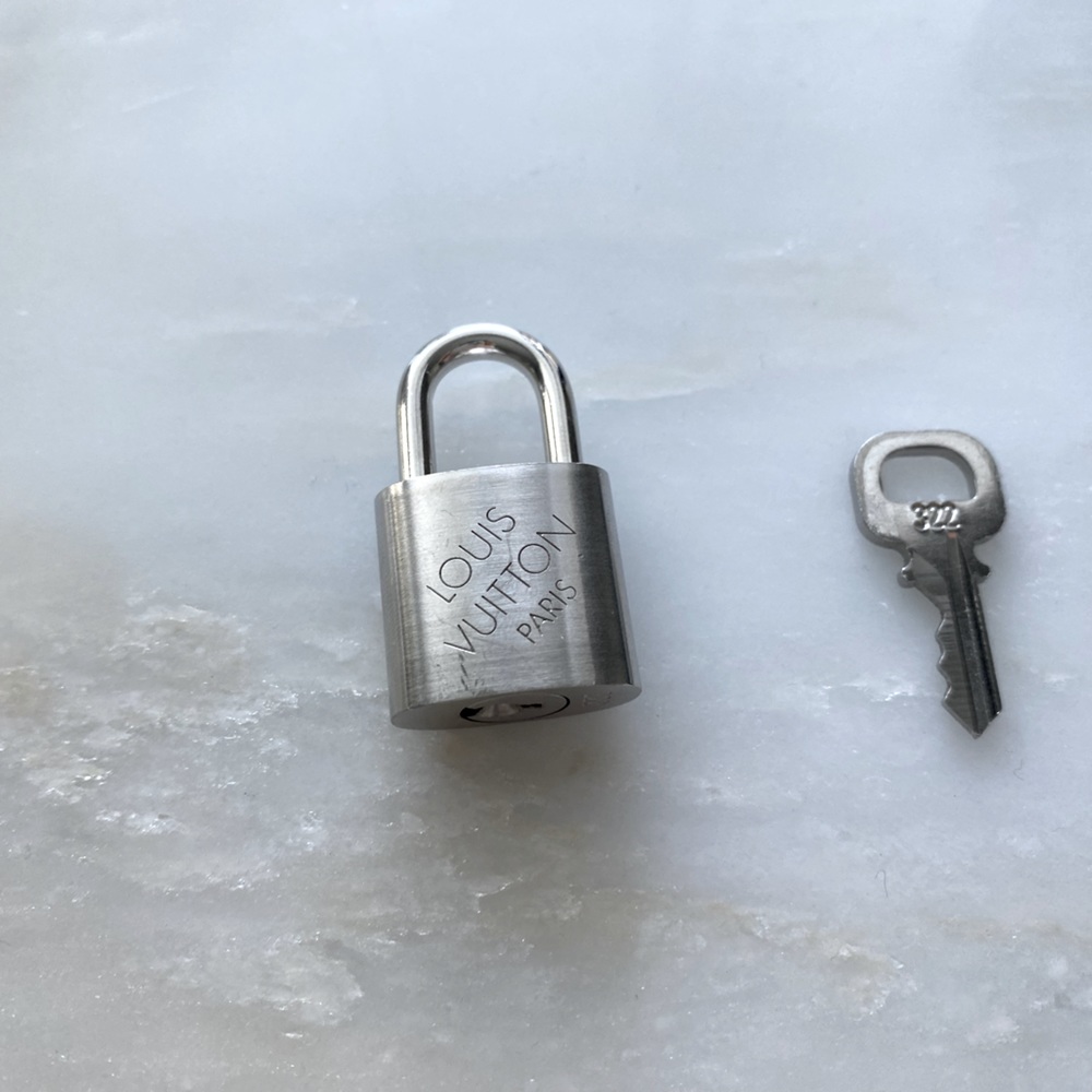 SILVER LOUIS VUITTON PADLOCK